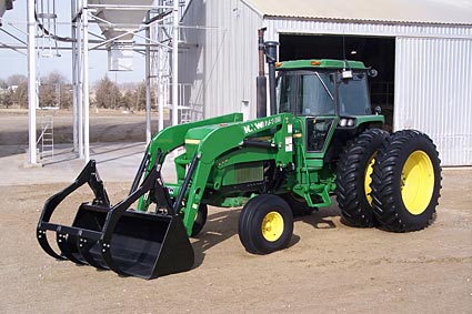 1660 Front End Loaders on two tractors